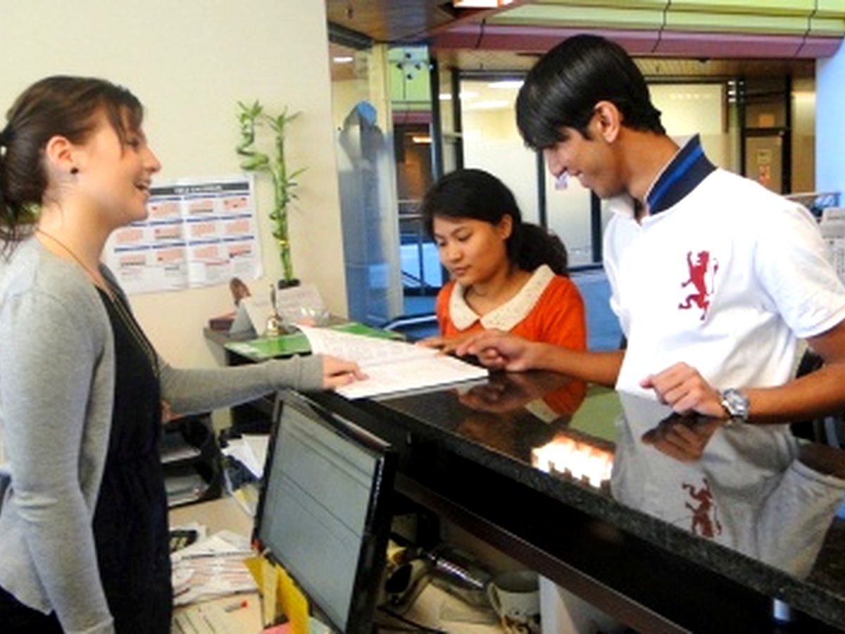 WIE students asking for study support at reception