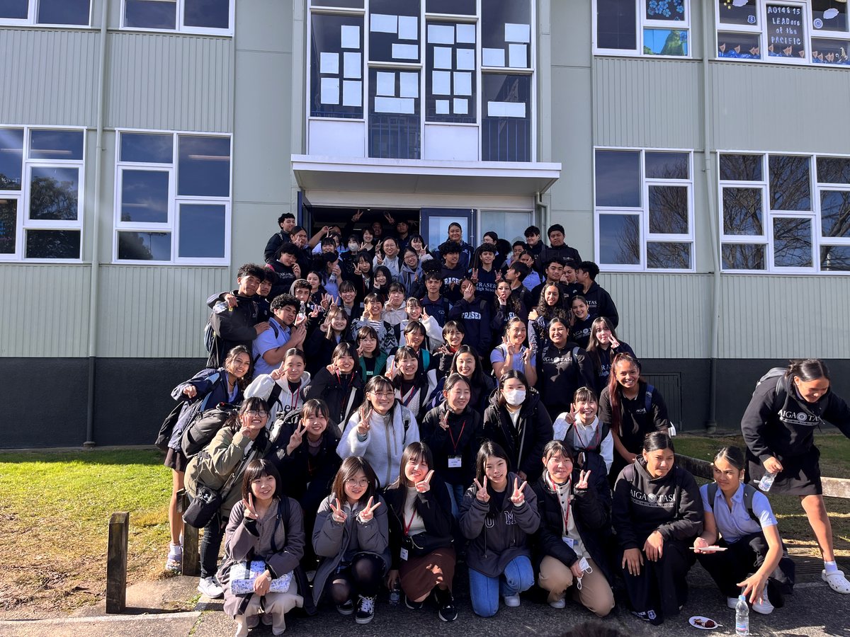 Large group photograph of international study tour students and local high school students posing together...